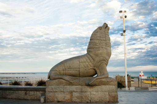 famous-place MAR DEL PLATA, BUENOS AIRES - DECEMBER 2019: View of the Sea Lion Statue, famous landmark of the coast of Mar del Plata City in Buenos Aires province, Argentina