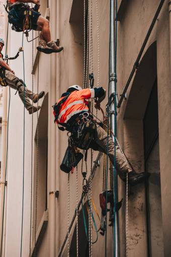 rope working adventure construction worker rope extreme sports men occupation