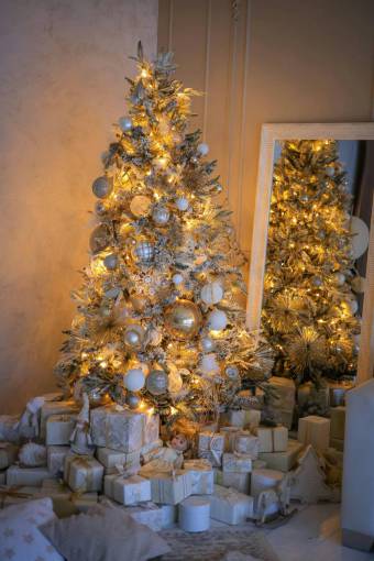 happy Christmas tree with golden decorations