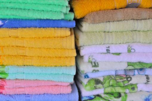 drying towel heap folded multi colored textile stack towels