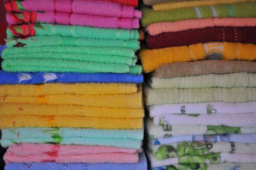 yellow towel multi colored heap textile stack towels folded