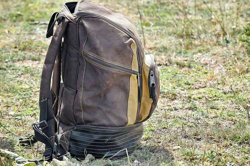 baggage baggage luggage container backpack material hiking grass outdoors adventure