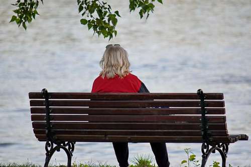 seat-belt bench park leisure seat outdoors blonde hair woman nature summer water
