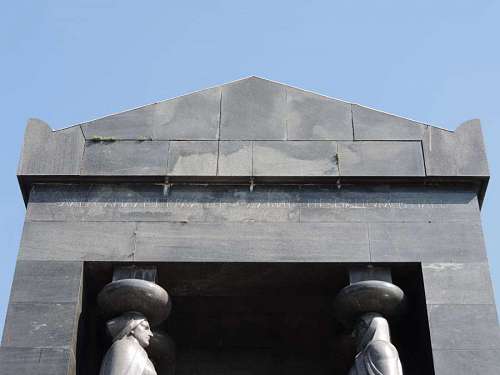 memories entrance gate sculpture concrete building grave memorial outdoors architecture