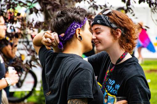 sex-symbol Close-up portrait of young lesbian couple. Queer couple