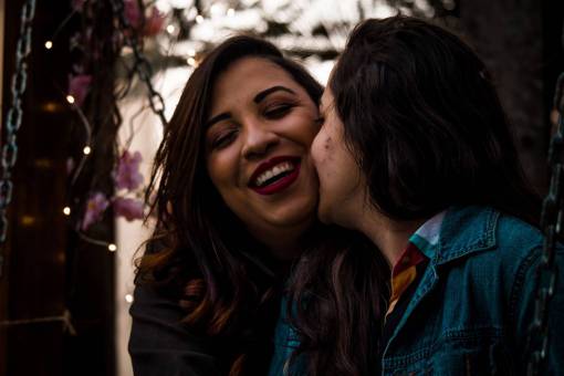 sex-symbol Close-up portrait of young lesbian couple. Queer couple