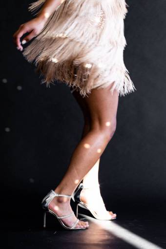 moving Woman dancing with heels and dress