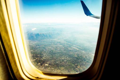 cloud window transportation air vehicle travel airplane;Window flying airplane
