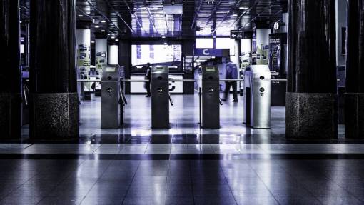 perspective architecture  subway  turnstiles  posts  light  people  lines