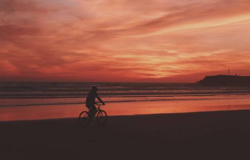 biking bike  dark  sea  ocean  clouds  sky  nature