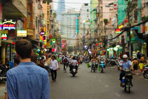 motor buildings  structure  town  people  crowd  walking  men