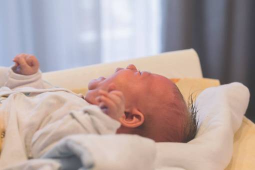 crying child  person  infant  people  lie  lay  cry