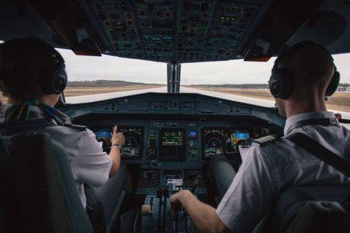 running cockpit  pilot  people  men  airplane  travel  transportation
