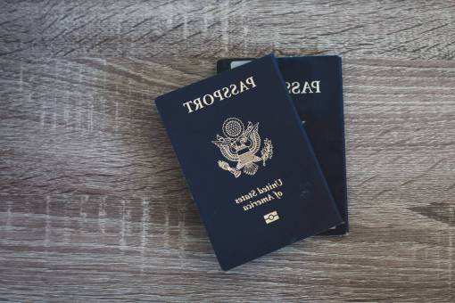 city passport  table  travel  close up  flat lay  wood  american
