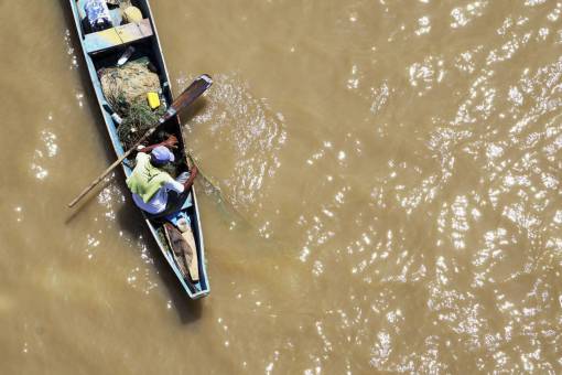 cropped people  man  boat  water  sea  dirty  crops