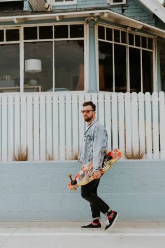 fences people  man  guy  walking  alone  play  skateboard