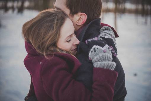 hugging people  man  woman  couple  hug  love  snow