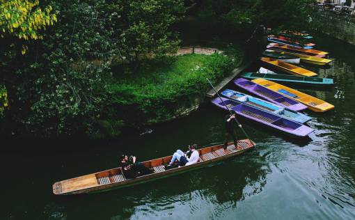 people  men  guys  girl  boat  sailing  pole