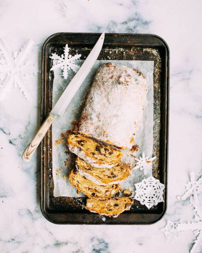 raised raisin  bread  knife  pan  powder  sugar  food