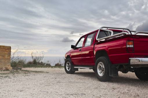 track red  offroad  truck  pickup  car  transport  road