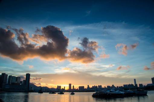 yacht sea  ocean  dark  clouds  sky  sunset  skyline