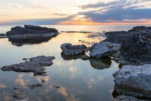 puesta de sol de agua mar océano agua rock reflexión naturaleza horizonte