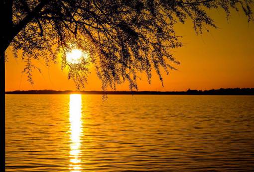 luz del sol puesta de sol luz del sol sol mar océano agua reflexión