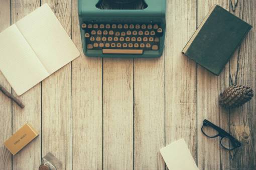 old wood  typewriter  book  pine cone  eyeglasses  notepad  paper