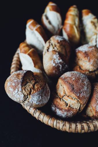 loaf-of-bread baguettes on black background