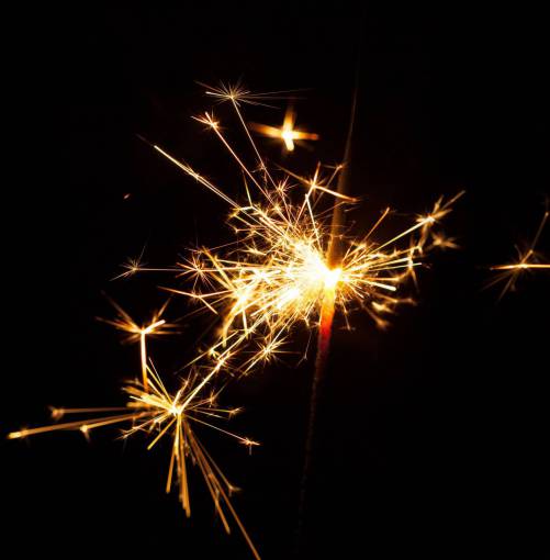 back-lit Close-Up Of Lit Sparkle on Back Background