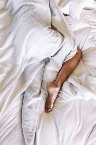 Portrait of a woman sleeping at bed