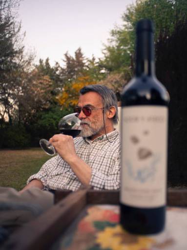 senior Man drinking Wine