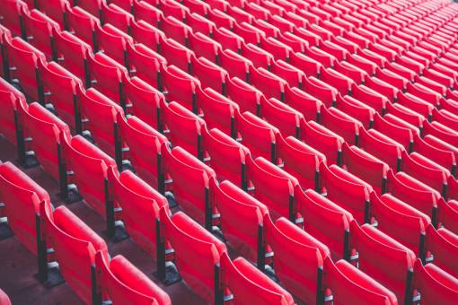 row chair auditorium empty bleachers;stadium;red sport seat in a row