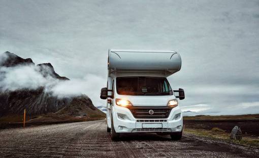 landscape Camper Traveling Through Iceland – Adventure, Nature, and Exploration