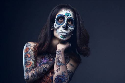 Day of the Dead;skull;painted face caucasian ethnicity adult halloween portrait one person women