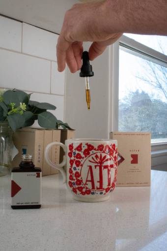 coffee men cannabis oil coffee drink adult human hand indoors