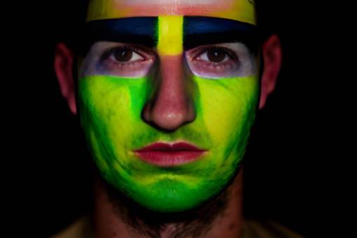 front-view portrait soccer;fan;brazil;painted;face human face one person men face paint adult