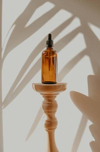 shadow sunlight bottle close-up shadow cannabis oil sun