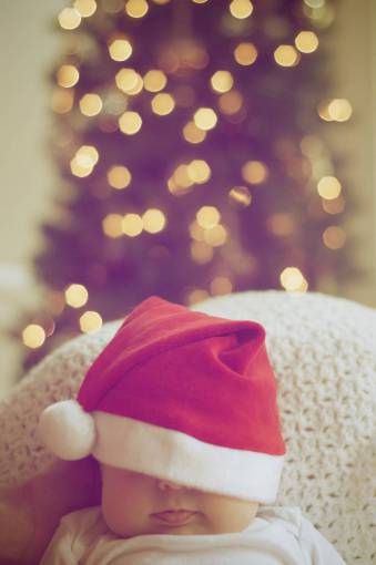 new Baby with Christmas Hat Sleeping at home