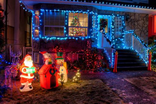 residential Facade of house illuminated with christmas lights