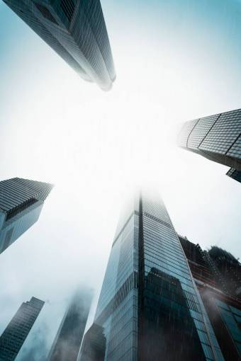 Mirrored buildings seen from below in the city center