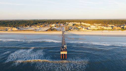 bridge  structure  buildings  coast  beach  people  crowd