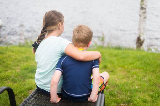 sister brother  sister  young  children  kids  hug  sitting