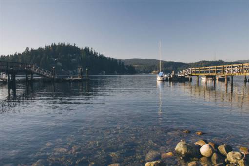 cottage docks  boats  lake  water  rocks  cottages  mountains