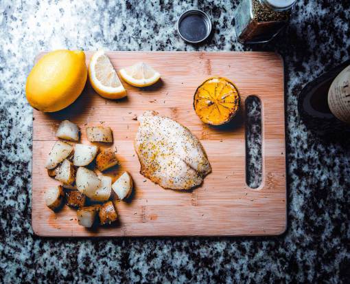 spice fish  lemon  chopping board  cooking  food  knife  herbs