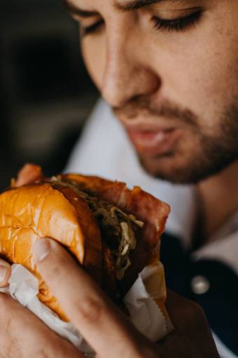 fast Man eating burger