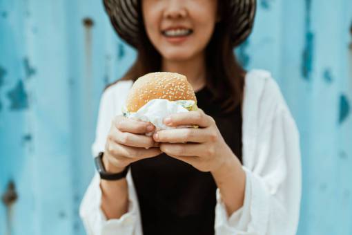 Woman eating burger