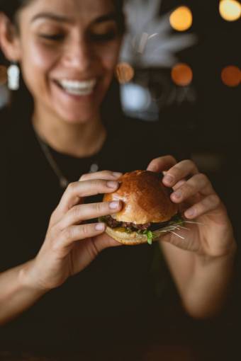 Woman eating burger