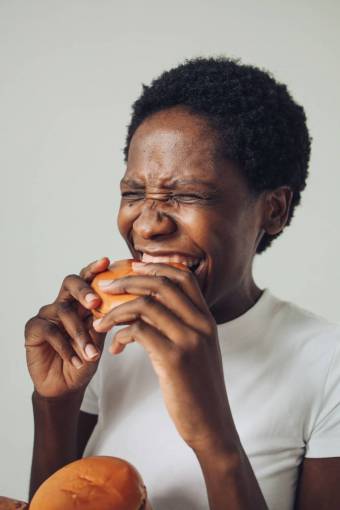 Woman eating burger