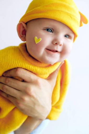 smiling Baby in yellow costume